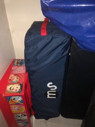 Cuna de viaje y madera