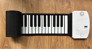 Piano enrollable 61 teclas