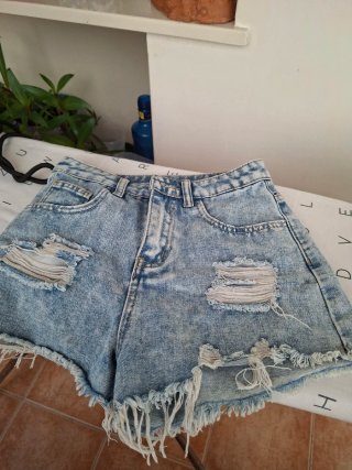 Shorts vaqueros rotos niña