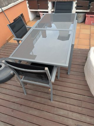 Mesa de jardín extensible cristal y metal y sillas