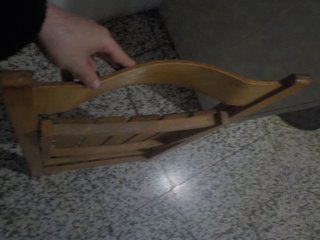 Silla de madera plegable.
