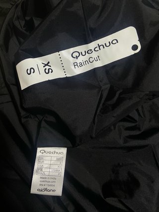 Giacca a vento Quechua nero uomo