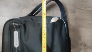 Bolso bandolera Samsonite negro.