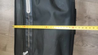 Bolso bandolera Samsonite negro.