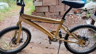 Bicicleta BMX dorada