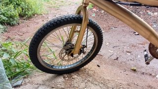 Bicicleta BMX dorada