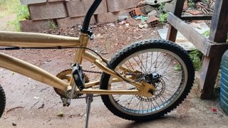 Bicicleta BMX dorada