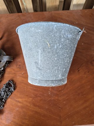 Cubo y polea de pozo