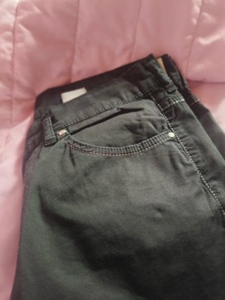 Jeans pinocchietto neri con rifiniture argentate