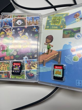 Nintendo Switch + funda Animal Crossing + 2 juegos