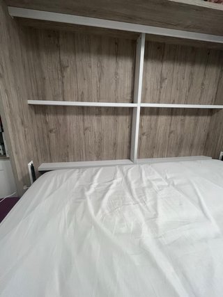 Cama abatible con sillón