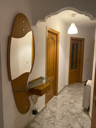 Entradita de madera y cristal
