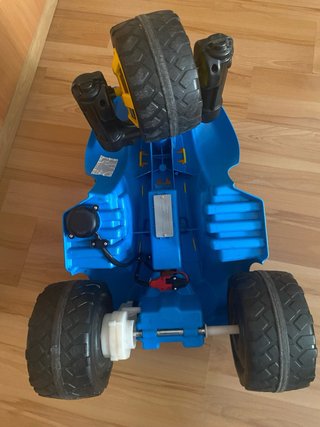 Triciclo infantil azul y amarillo