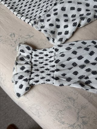 Blusa Noon manga larga estampada