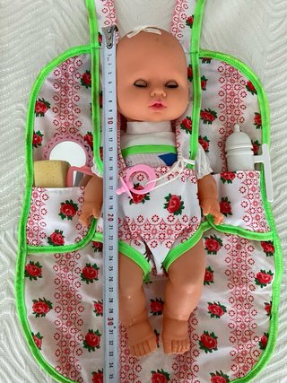 Muñeca bebé con accesorios