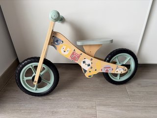 Bici de madera infantil con animales