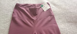 Pantalones acampanados color malva