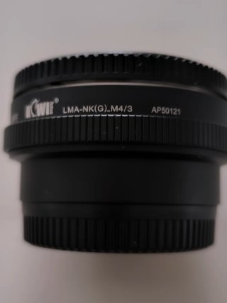 Adaptador Objetivo Nikon a M4/3.sin contactos