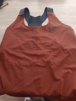 Top deportivo pádel naranja y gris