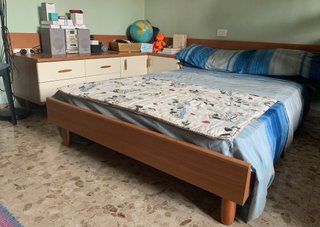 Letto una piazza e mezza con cassettiera ad angolo