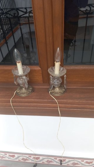 Lámparas antiguas doradas y cristal