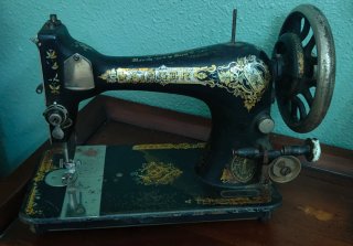 Maquina de coser singer