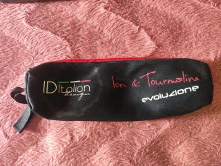 Plancha de pelo GHD negra y amarilla