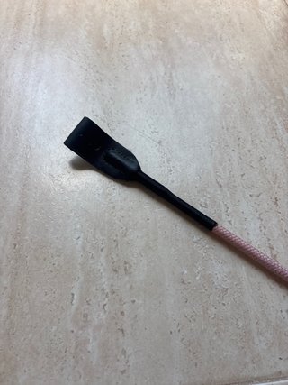 Fusta de equitación rosa