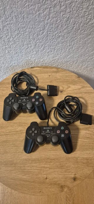 PlayStation 2 + Buzz + Cámara + Mandos + Guitarra
