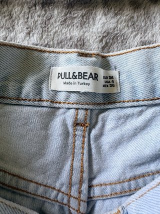 Pantaloncini vita alta strappati