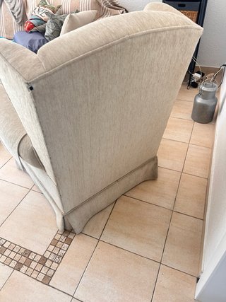 Sillón orejero beige tela