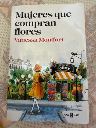 Mujeres que compran flores