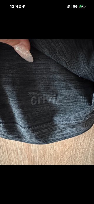Camiseta térmica Crivit negra y turquesa