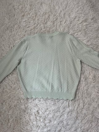 Jersey verde de punto con escote redondo