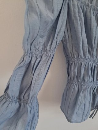Blusa suelta azul grisáceo talla S