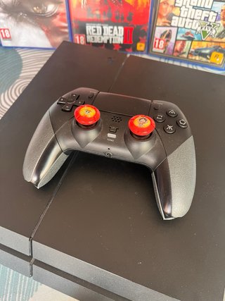 PS4 con Mandos y Juegos