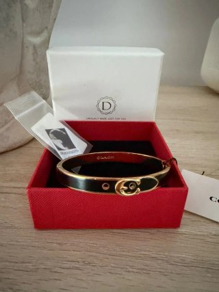 Pulsera Coach Negra y Dorada Nueva