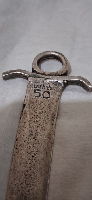 Lote dos joyas Daga UNO DE 50 y otro estilo azteca