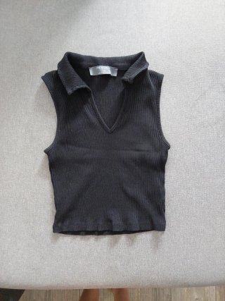 Camiseta sin mangas cuello polo negra XS