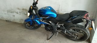 Moto Kawasaki 125cc azul