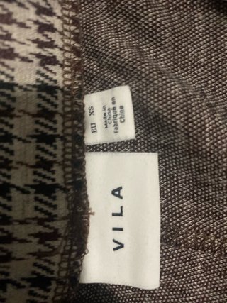 Pantalones de cuadros beige y marrón