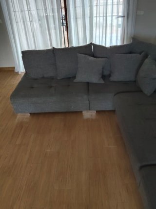 Sofá modular gris de tela