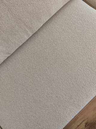 Sofá beige de tela en perfecto estado