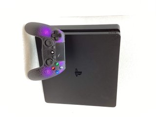 Consola PS4 Slim 1TB + Mando Morado