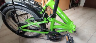 Bicicleta plegable verde nakon