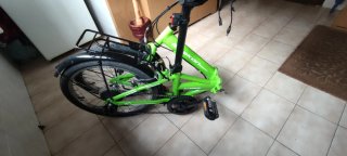 Bicicleta plegable verde nakon