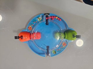 Tragabolas Juego de Mesa