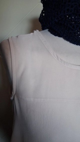 Blusa donna asimmetrica smanicata