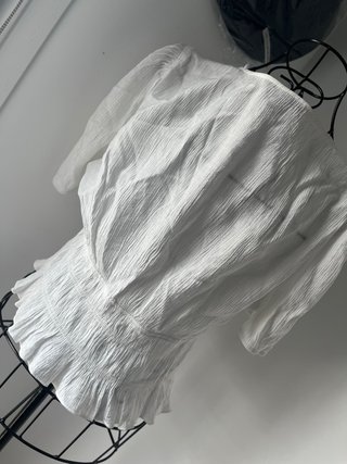 Blusa blanca con botones