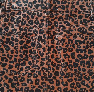 Falda leopardo, corte vaquero. Marrón/negro. T. S